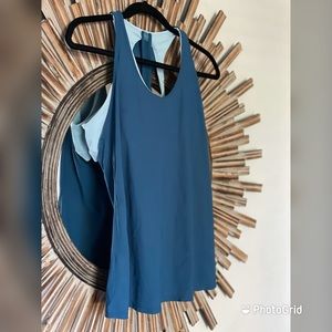 Size 8 Lululemon tank with built in sports bra. EUC